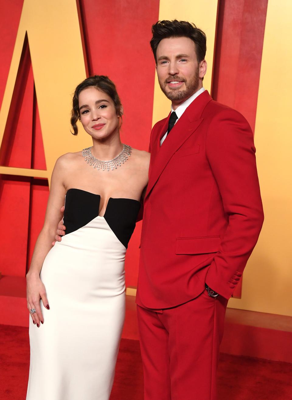 Alba Baptista and Chris Evans attend the 2024 Vanity Fair Oscar Party on March 10, 2024.