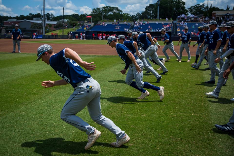 The Georgia Southern baseball team warms up before the game against Texas Tech on Sunday, June 5, 2022 in the Statesboro Regional at J.I. Clements Stadium. Texas Tech won 3-1 to eliminate the Eagles.
