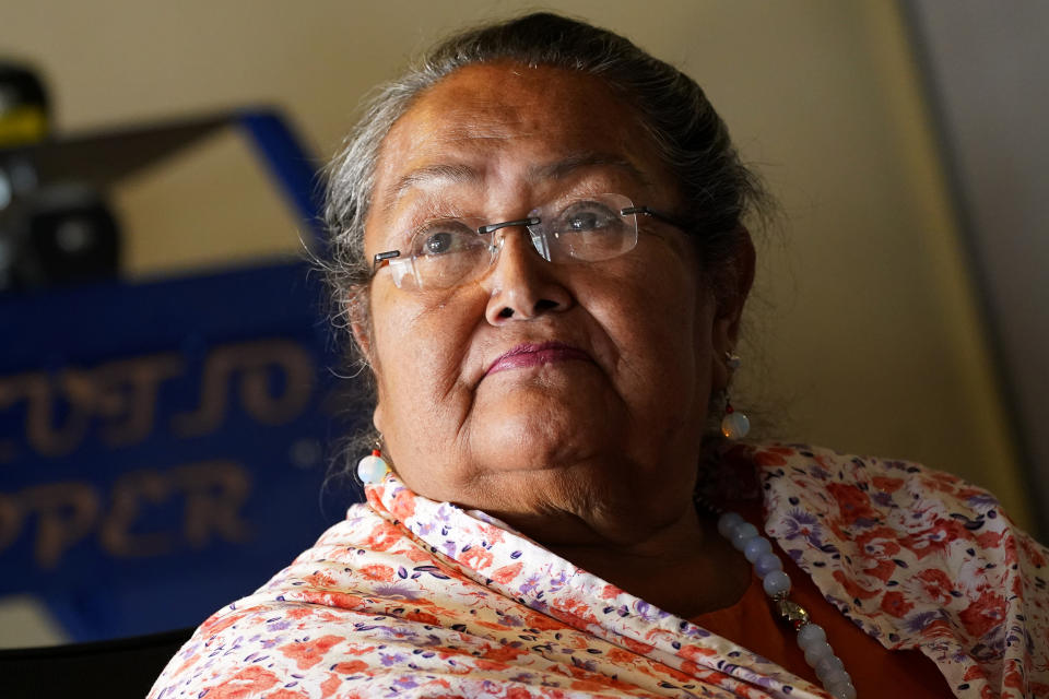 Karen Kitcheyan-Jones, 64, the widow of a miner, speaks during an interview, Friday, June 9, 2023, in Superior, Ariz. “Oak Flat is not sacred,” said Karen Kitcheyan-Jones, 64, a member who lives on the reservation. “There are many places on the reservation where we can gather acorns and have ceremonies." (AP Photo/Matt York)