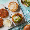 <p>These healthy salmon burgers call for canned salmon, which makes them an economical and easy dinner. The quick-pickled cucumbers in this recipe are a great introduction to the world of pickling. If you enjoy them, you can make additional batches by following Steps 1 and 2. <a href="https://www.eatingwell.com/recipe/273181/salmon-burgers-with-quick-pickled-cucumbers/" rel="nofollow noopener" target="_blank" data-ylk="slk:View Recipe" class="link ">View Recipe</a></p>