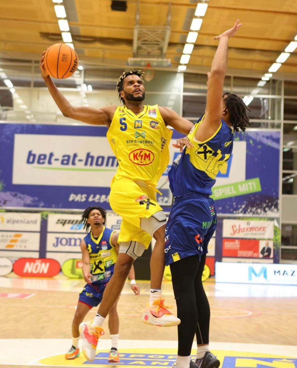 Former Booker T. Washington and Florida A&M basketball player M.J. Randolph (5) is now starring in Austria, looking to work his way up in pro basketball in Europe.