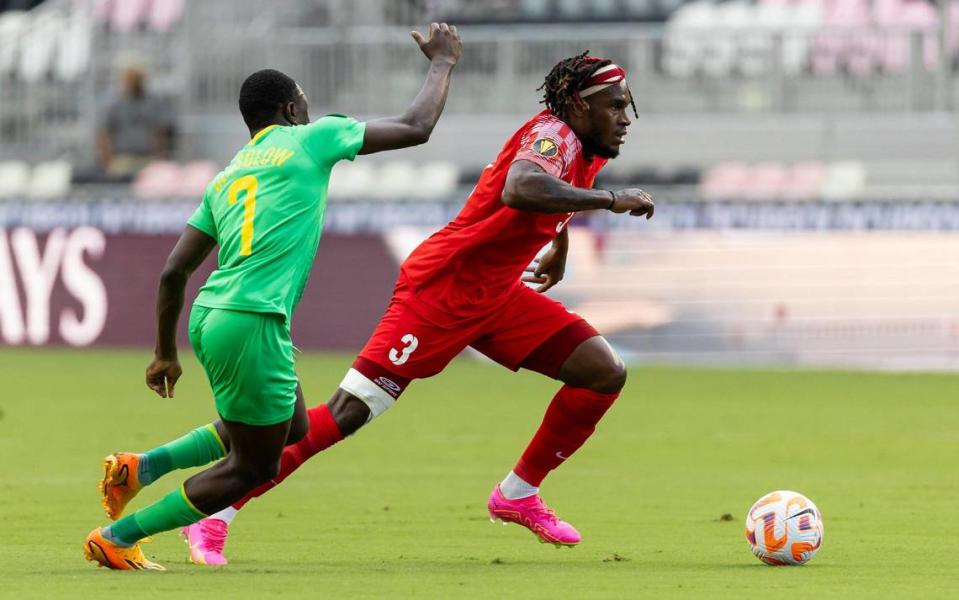 Guadeloupe defender Andreaw Rayan Gravillon (3) dribbles with the ball as Guyana defender Omari Glasgow (7) chases behind in the first half of their CONCACAF Gold Cup 2023 preliminary match at DRV PNK Stadium on Tuesday, June 20, 2023, in Fort Lauderdale, Fla.
