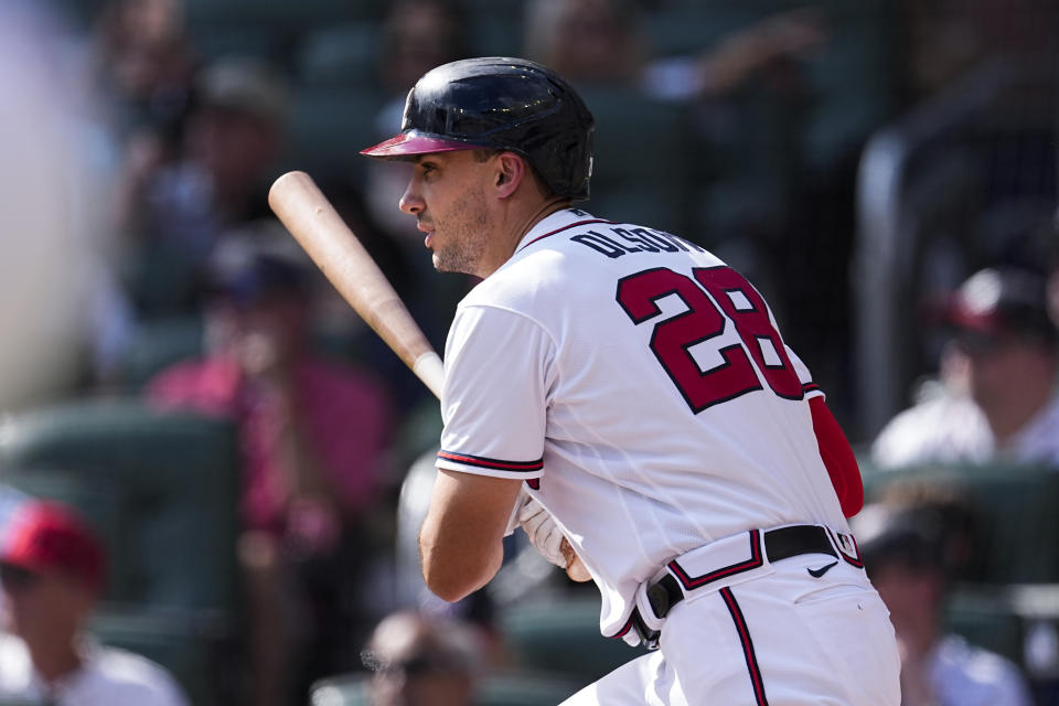 Atlanta Braves' Matt Olson drives in two runs with a base hit in the first inning of a baseball game against the Washington Nationals, Sunday, Oct. 1, 2023, in Atlanta. (AP Photo/John Bazemore)