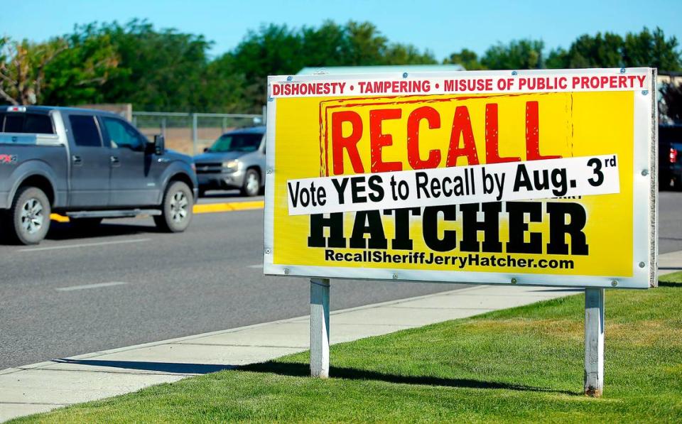 A 2021 campaign sign urges voters to recall former Benton County Sheriff Jerry Hatcher.