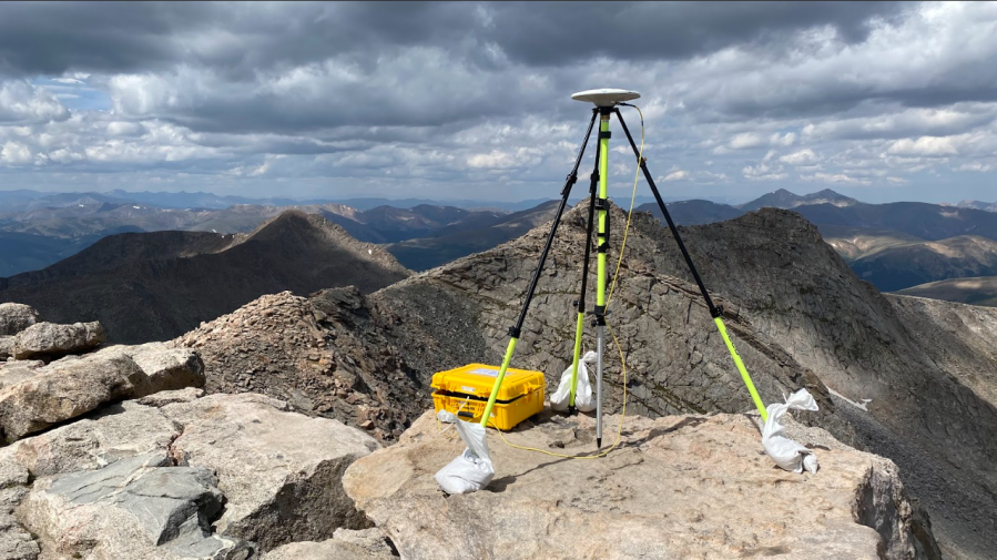 Static GNSS Survey of mountain summit station at the top of Mt. Blue Sky. (Photo: Brian Shaw, National Geodetic Survey)