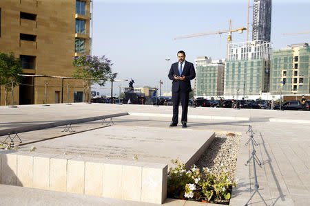 Lebanon's Prime minister-designate Saad al-Hariri prays at the grave of his father, assassinated former Lebanese prime minister Rafik al-Hariri, in downtown Beirut, Lebanon May 24, 2018. REUTERS/Dalati Nohra/Handout via REUTERS