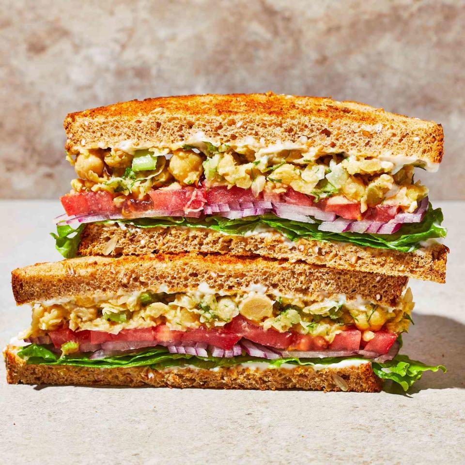 <p>This vegan chickpea salad sandwich is lemony, bright and surprisingly delicious. It's got all the flavors of a classic tuna salad sandwich—dill, lemon and a bit of garlic—but with chickpeas instead to add a vegan source of protein and a healthy boost of fiber. Celery brings a nice crunch.</p> <p> <a href="https://www.eatingwell.com/recipe/7923367/chickpea-salad-sandwich/" rel="nofollow noopener" target="_blank" data-ylk="slk:View Recipe;elm:context_link;itc:0;sec:content-canvas" class="link ">View Recipe</a></p>