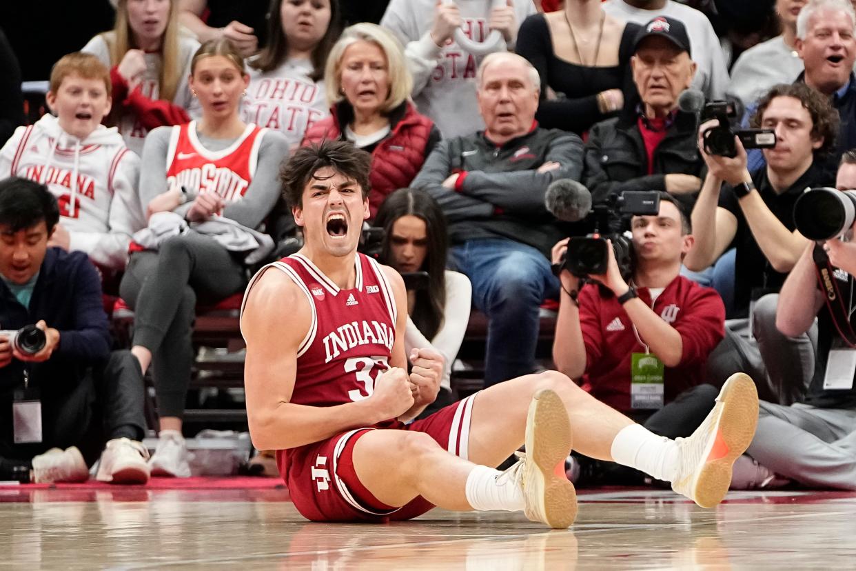 Feb 6, 2024; Columbus, Ohio, USA; Indiana Hoosiers guard Trey Galloway (32) reacts after drawing a foul during the second half of the men’s basketball game against the Ohio State Buckeyes at Value City Arena. Ohio State lost 76-73.