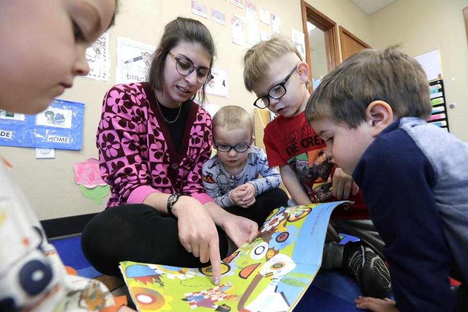 Vanessa Hanagan, an early childhood student teacher, reads to a group of children at Appletree Connections Tuesday, April 18, 2023, in Appleton, Wis. Hanagan is studying early childhood education at Fox Valley Technical College.
Dan Powers/USA TODAY NETWORK-Wisconsin.
