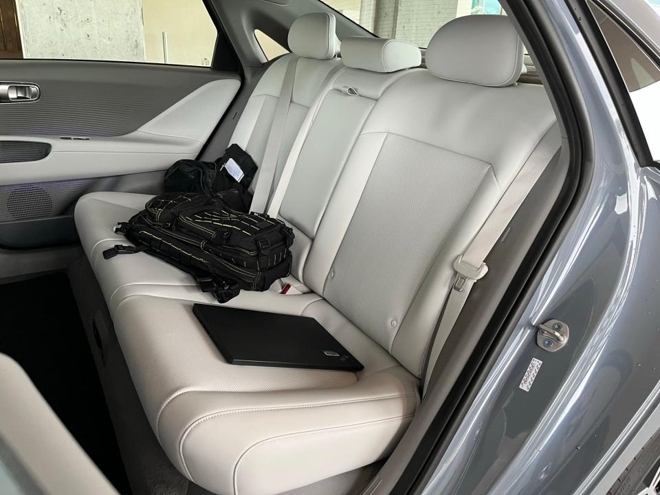 The 2023 Hyundai Ioniq 6 electric vehicle's rear seat was designed to encourage passengers to sit at an angle, for work, conversation or comfort.