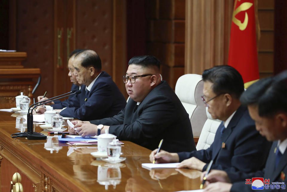 In this photo provided by the North Korean government, North Korean leader Kim Jong Un attends a ruling party meeting in Pyongyang, North Korea, Thursday, Aug. 13 2020. Independent journalists were not given access to cover the event depicted in this image distributed by the North Korean government. The content of this image is as provided and cannot be independently verified. Korean language watermark on image as provided by source reads: "KCNA" which is the abbreviation for Korean Central News Agency. (Korean Central News Agency/Korea News Service via AP)