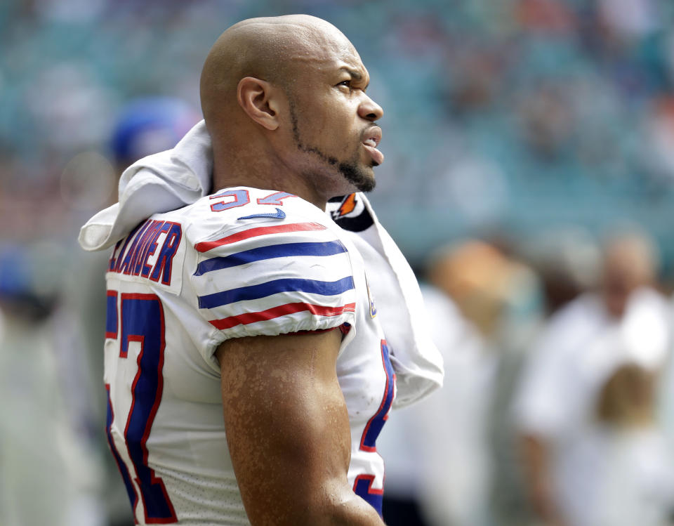 FILE - In this Dec. 2, 2018, file photo Buffalo Bills outside linebacker Lorenzo Alexander (57) looks up from the sidelines, during the first half of an NFL football game against the Miami Dolphins in Miami Gardens, Fla. Vowing to retire after this season, the 13-year NFL veteran knows Sunday's regular-season finale against the New York Jets won't be his final game for the playoff-bound Bills. (AP Photo/Lynne Sladky, File)