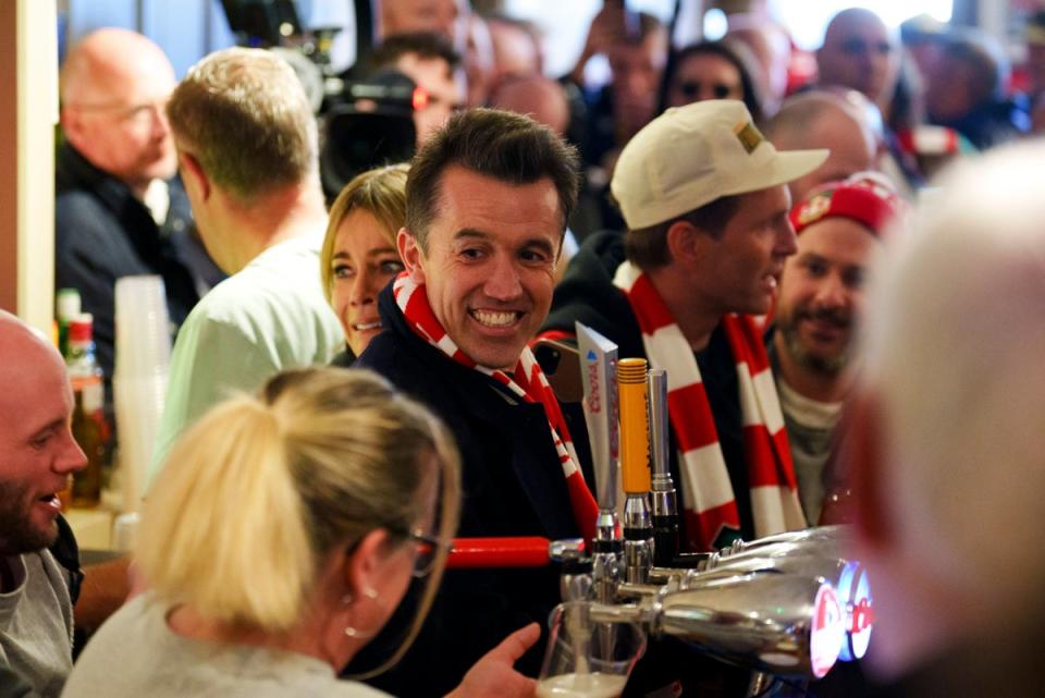 Rob McElhenney gets the beers in at The Turf pub (AP)