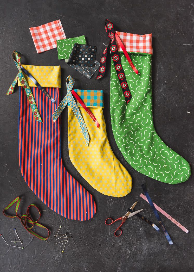 <p>Make everyone in the family their own Christmas stocking to use year after year. These easy DIY stockings from <a href="https://thehousethatlarsbuilt.com/2018/12/diy-custom-christmas-stockings.html/" rel="nofollow noopener" target="_blank" data-ylk="slk:The House House Lars Built;elm:context_link;itc:0;sec:content-canvas" class="link ">The House House Lars Built</a> are upbeat and festive but also unique. </p>