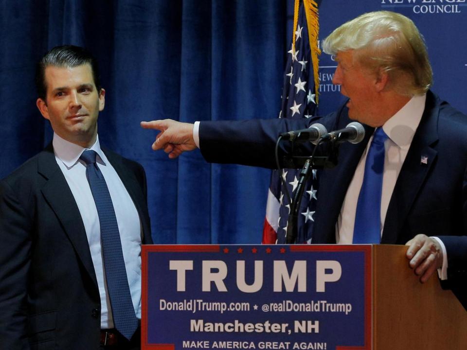 Donald Trump introduces his eldest son, who is likely to be scrutinised by Mr Mueller's probe, during last year's election campaign(Brian Snyder/Reuters)
