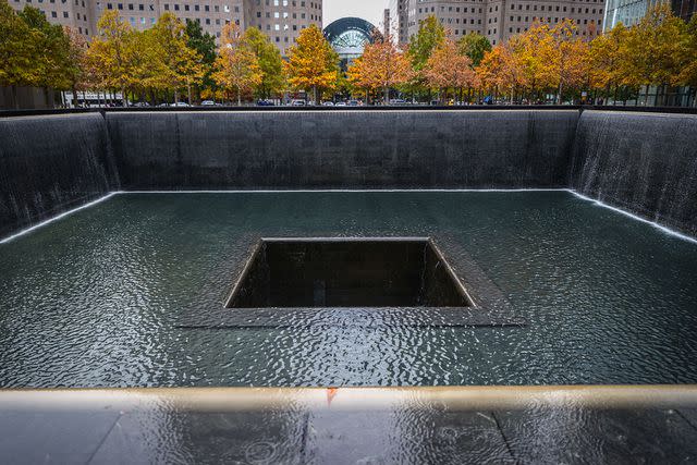 <p>Beata Zawrzel/NurPhoto via Getty Images</p> 'Reflecting Absence' by architect Michael Arad and landscape architect Peter Walker, known as the South Tower Memorial Pool at the National 9/11 Memorial in New York City, United States on October 23, 2022.