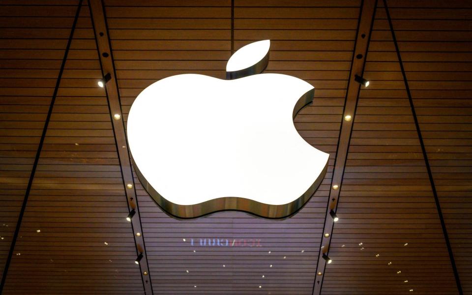 Apple logo is seen at a company store in an upscale shopping mall in Bangkok. - Mladen Antonov/AFP