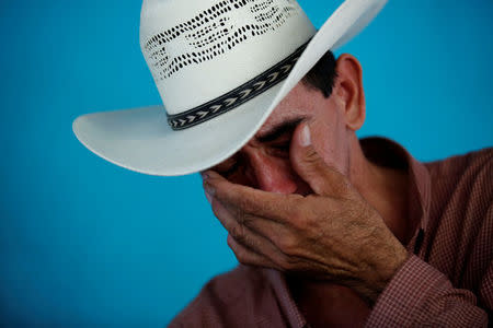 Jose Guardado, 42, a deportee from the U.S. and separated from his son Nixon Guardado, 12, at the McAllen entry point as a result of the Trump administration's hardline immigration policy, gestures during an interview with Reuters at his home in Eden, Lepaera, Honduras June 23, 2018. REUTERS/Carlos Jasso