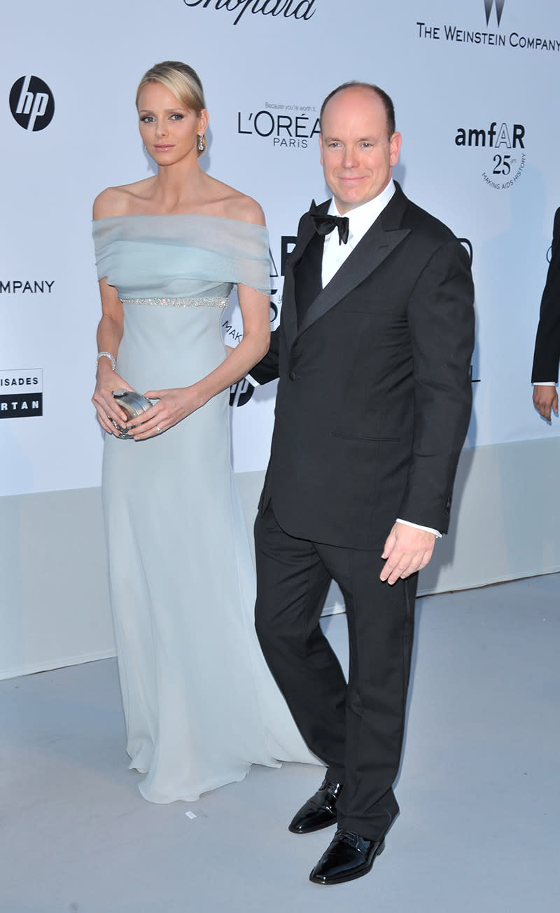 Prince Albert of Monaco (R) and princess Charlene Wittstock dress attend amfAR's Cinema Against AIDS Gala during the 64th Annual Cannes Film Festival at Hotel Du Cap on May 19, 2011 in Antibes, France. (Photo by George Pimentel/FilmMagic)