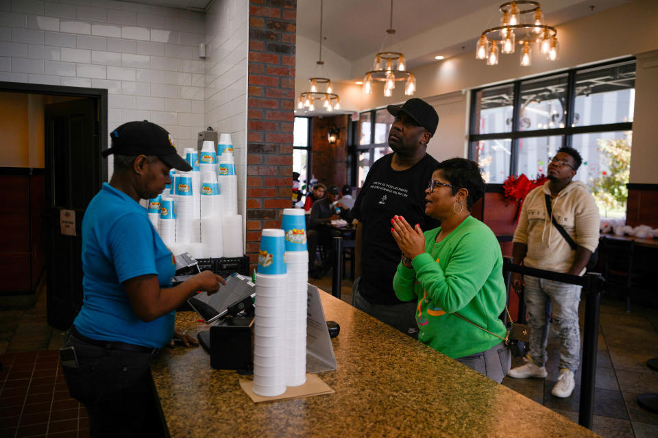 Esther Jackson, 56, takes orders from customers at Frenchy's Chicken, a Houston-based restaurant chain that received a shoutout in Beyoncé’s blockbuster “Renaissance” film, on Dec 12, 2023 in Houston, Texas.