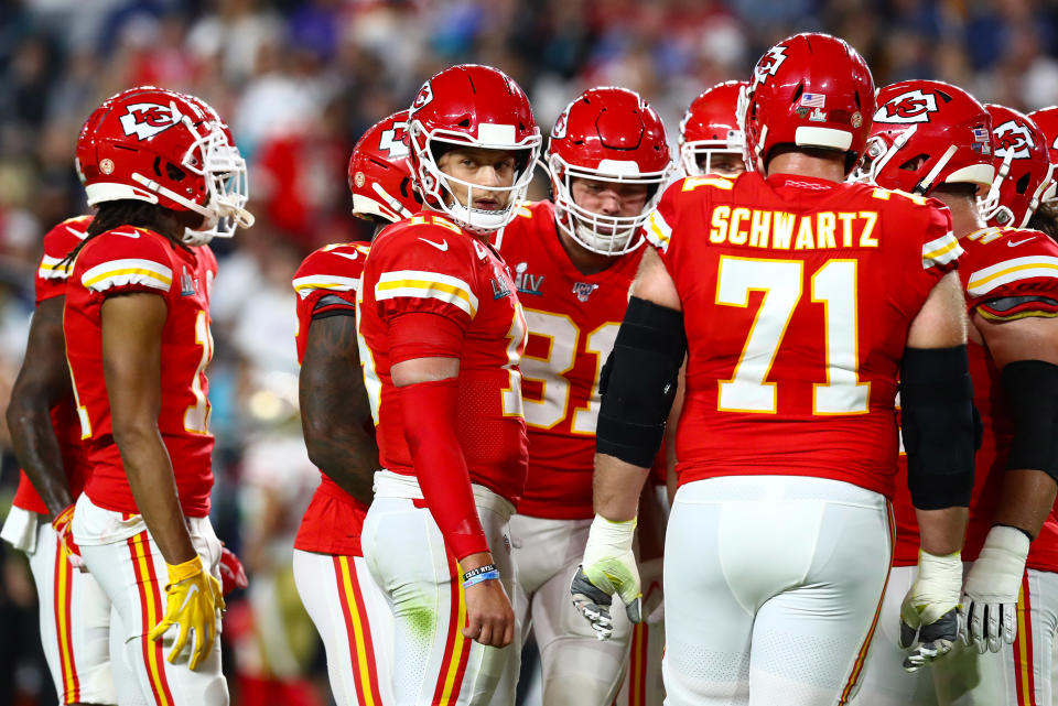 Feb 2, 2020; Miami Gardens, Florida, USA; Kansas City Chiefs quarterback Patrick Mahomes (15) looks to the sidelines while in the huddle during the first quarter against the San Francisco 49ers in Super Bowl LIV at Hard Rock Stadium. Mandatory Credit: Matthew Emmons-USA TODAY Sports