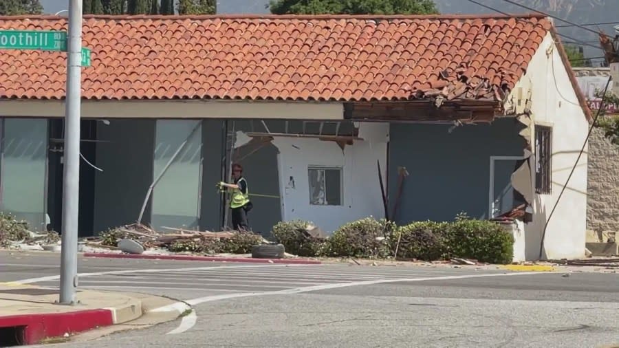 The vehicle involved in crashed into this nearby building in Pasadena. Three people were killed, and three others injured. The victims are believed to be aged between 17 and 22 years old. The crash occurred in Pasadena on May 11, 2024. (KTLA)