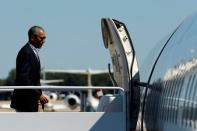 U.S. President Barack Obama boards Air Force One for travel to view flood damaged area in Louisiana from Joint Base Andrews, Maryland, U.S., August 23, 2016. REUTERS/Jonathan Ernst