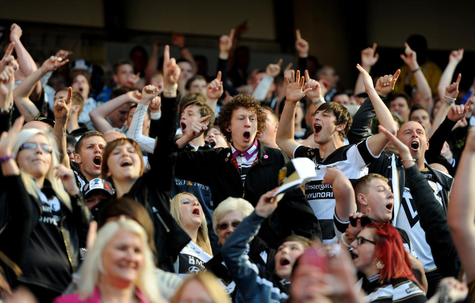 Hull FC fans celebrate in the stands during the Super League Magic Weekend at the Etihad Stadium, Manchester.