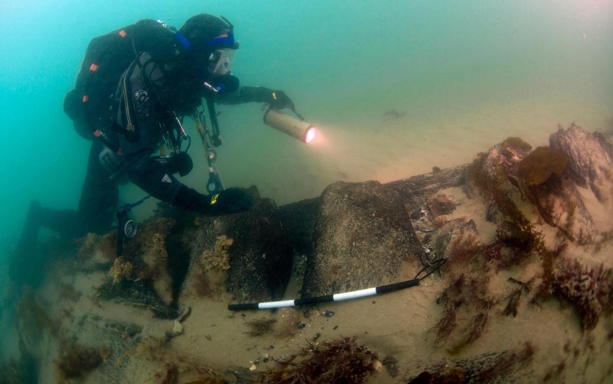 The skeleton of the original HMS Invincible  emerges from the seabed. - BNPS