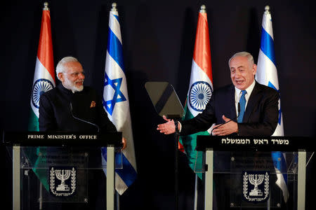 Indian Prime Minister Narendra Modi listens to Israeli Prime Minister Benjamin Netanyahu during an exchange of co-operation agreements ceremony in Jerusalem July 5, 2017. REUTERS/Amir Cohen