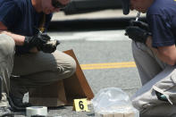 <p>Members of the FBI Evidence Response Team collect info of a piece of evidence at the site of this morning’s shooting at Eugene Simpson Stadium Park June 14, 2017 in Alexandria, Va. (Photo: Alex Wong/Getty Images) </p>