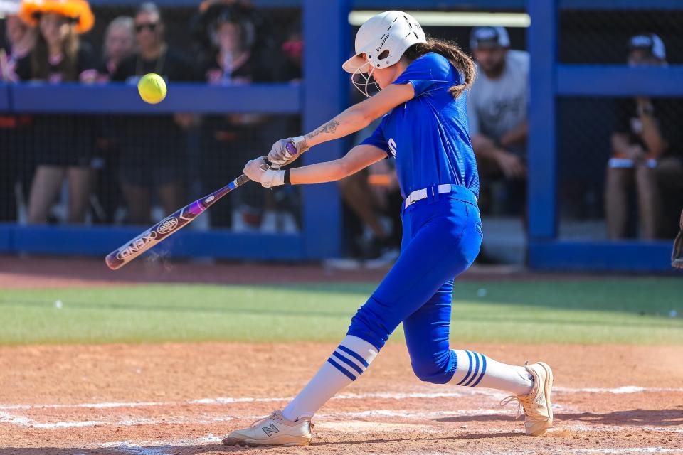 Piedmont's Karissa Fiegener (00) hits a pitch during the Class 5A fastpitch softball state tournament championship game against Coweta at the USA Softball Hall of Fame Complex on Oct. 15, 2022.
