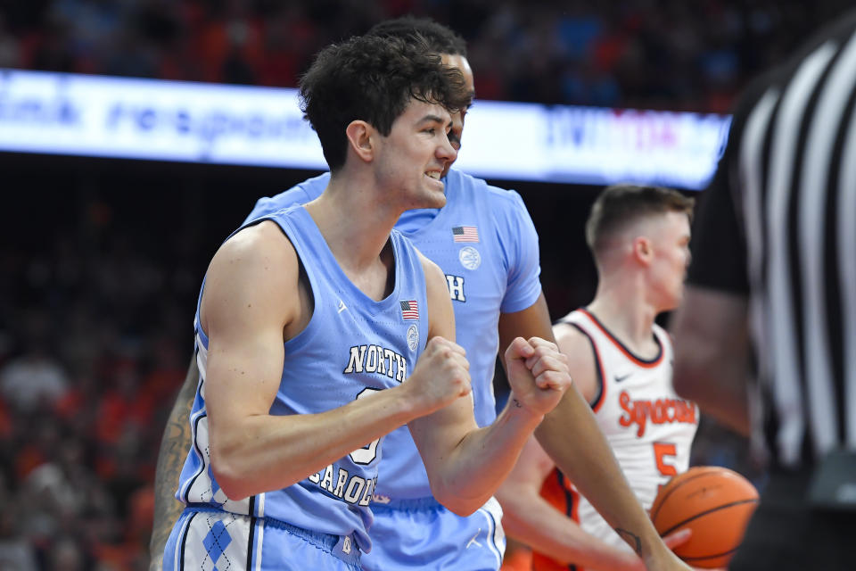 North Carolina guard Cormac Ryan (3) reacts during the first half of an NCAA college basketball game against Syracuse in Syracuse, N.Y., Tuesday, Feb. 13, 2024. (AP Photo/Adrian Kraus)