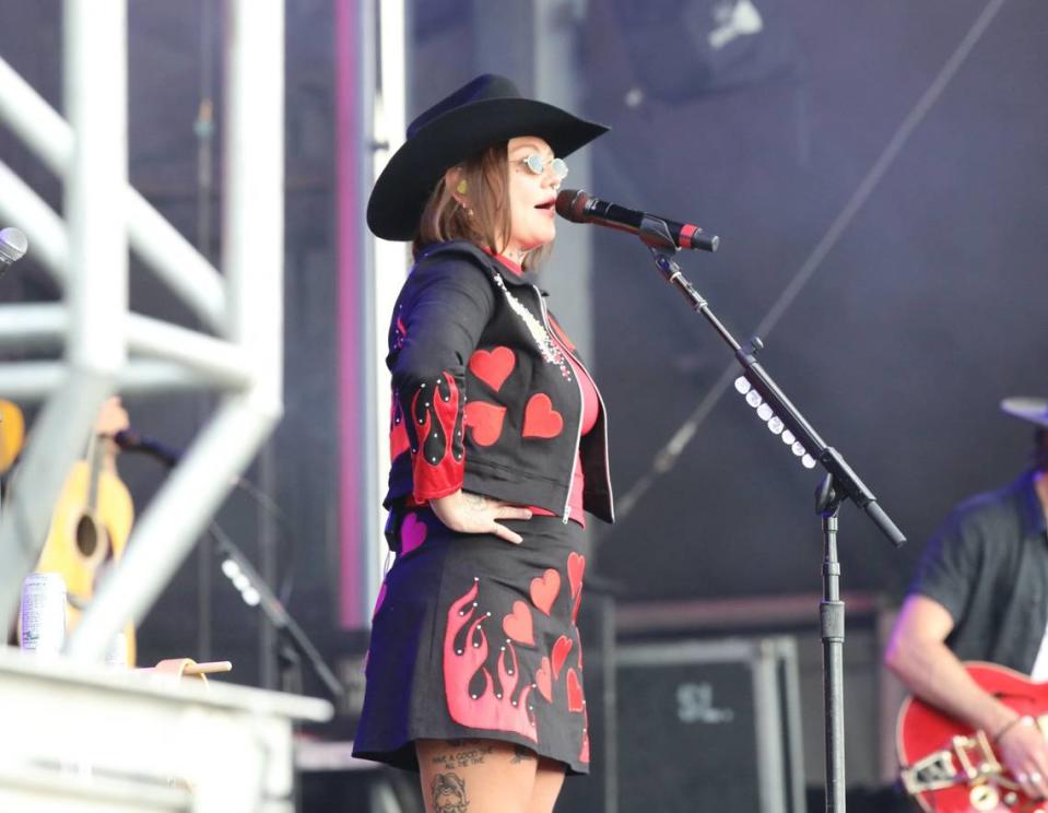 Grammy-nominated country singer-songwriter Elle King struts her stuff during the Railbird Music Festival on Sunday.