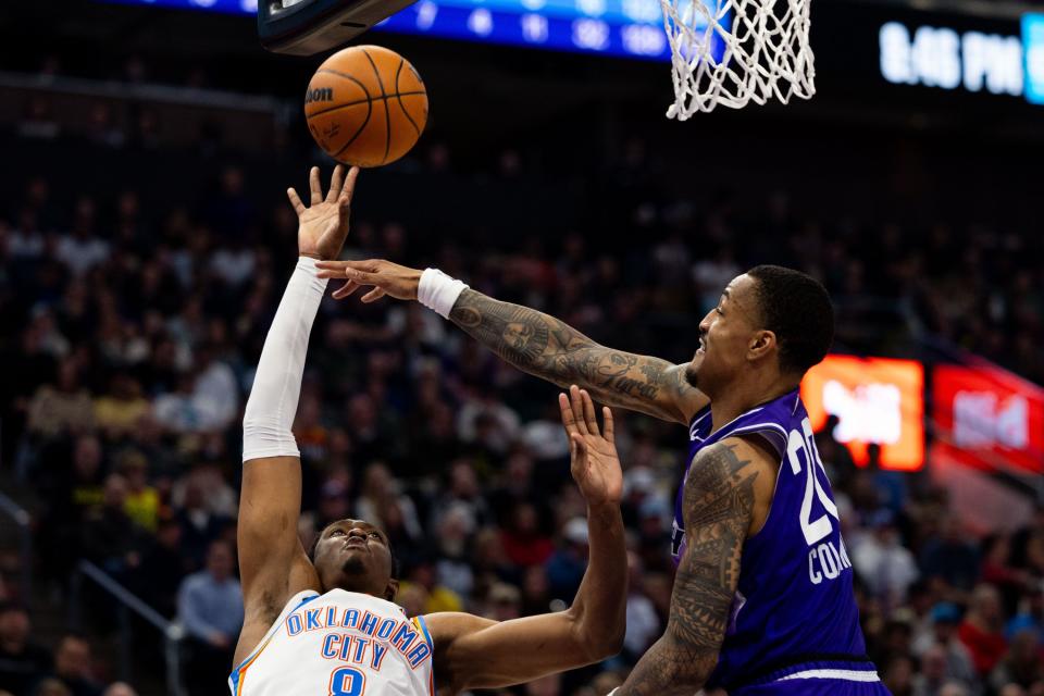 Utah Jazz forward John Collins (20) defends Oklahoma City Thunder forward <a class="link " href="https://sports.yahoo.com/nba/players/6702/" data-i13n="sec:content-canvas;subsec:anchor_text;elm:context_link" data-ylk="slk:Jalen Williams;sec:content-canvas;subsec:anchor_text;elm:context_link;itc:0">Jalen Williams</a> (8) on the shot during an NBA basketball game between the Utah Jazz and the Oklahoma City Thunder at the Delta Center in Salt Lake City on Tuesday, Feb. 6, 2024. | Megan Nielsen, Deseret News