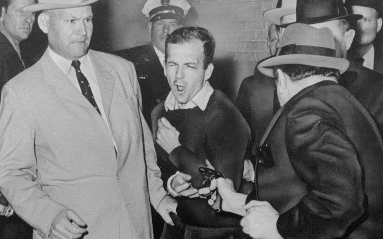 Lee Harvey Oswald, accused of assassinating John F Kennedy, is shot by Dalas nightclub owner Jack Ruby - AP