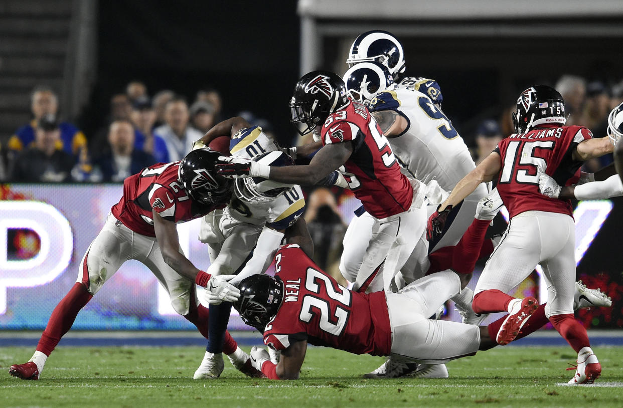 Atlanta Falcons players tackle Rams returner Pharoh Cooper in a playoff game last season. (AP)