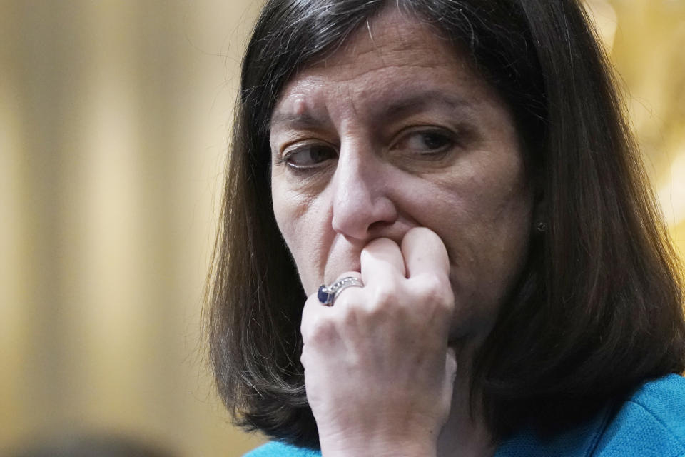 FILE - Rep. Elaine Luria, D-Va., listens as the House select committee investigating the Jan. 6, 2021, attack on the Capitol holds a hearing at the Capitol in Washington, June 16, 2022. Luria and Rep. Adam Kinzinger, R-Ill., who will lead questioning in the closing summer hearing of the Jan. 6 committee on July 21, are from opposite parties but agree emphatically on one thing: the investigation into the deadly insurrection at the U.S. Capitol is worth sacrificing their political careers.(AP Photo/J. Scott Applewhite, File)