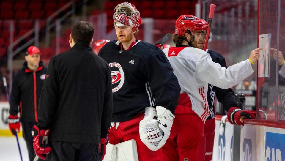 Carolina Hurricanes goaltender Frederik Anderson (31) talks with goaltending coach Paul Schonfelder during their practice on Thursday, May 2, 2024 at PNC Arena in Raleigh, N.C.