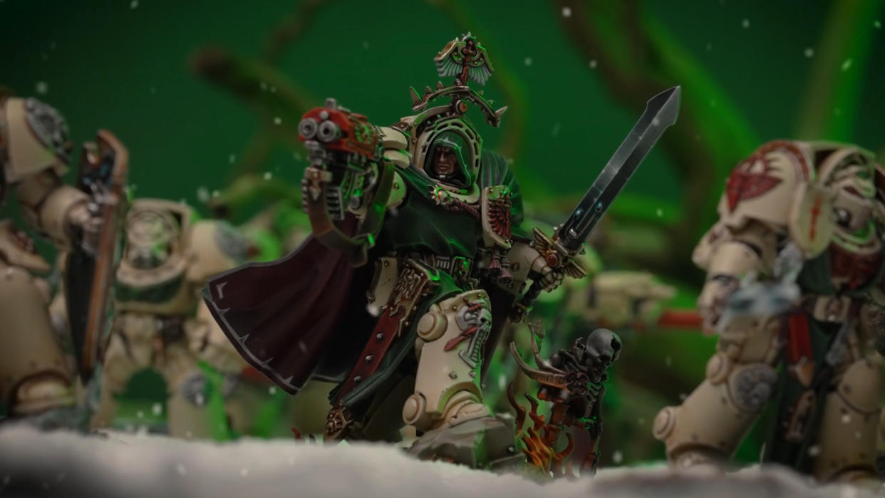  Grand Master Belial aims his bolter in the snow. 