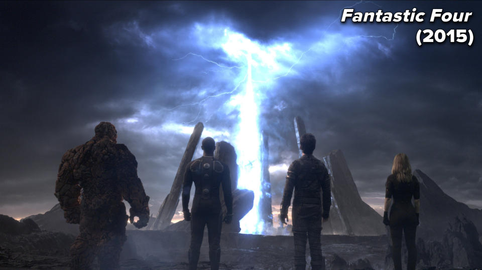 group of people looking up at a sky beam in the movie fantastic four