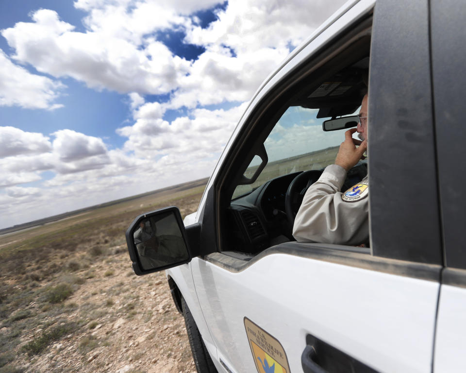 Jude Smith, a biologist at the Muleshoe National Wildlife Refuge outside Muleshoe, Texas, looks over dry native prairie on Tuesday, May 18, 2021. The U.S. Department of Agriculture is encouraging farmers in a “Dust Bowl zone” that includes parts of Texas, New Mexico, Oklahoma, Kansas and Colorado to preserve and establish grasslands, which can withstand drought. (AP Photo/Mark Rogers)