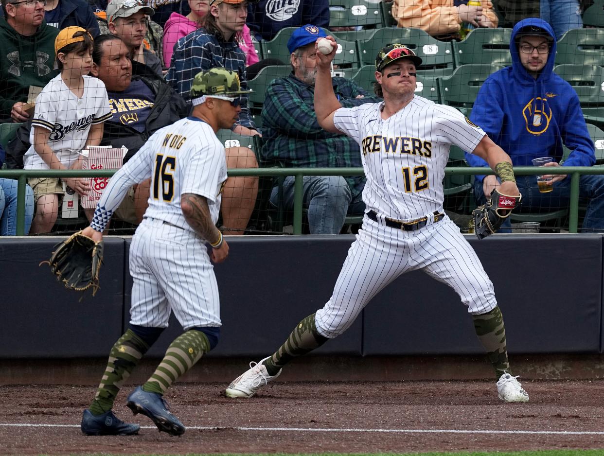 Milwaukee Brewers right fielder Hunter Renfroe (12) fields a single by Washington Nationals designated hitter Nelson Cruz during the fourth inning of their game Sunday, May 22, 2022 at American Family Field in Milwaukee, Wis.