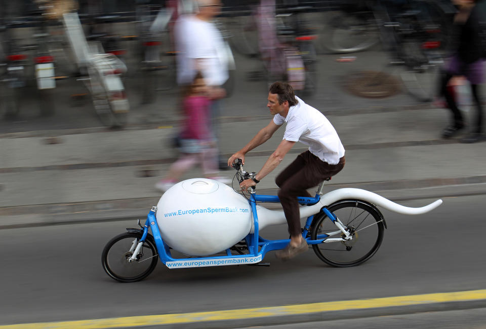 In this undated photo is the spermbike ' Spermbullit ' is seen on the streets of Copenhagen, Denmark. European cities promote cycling with everything from ‘superhighways’ to revolving bike racks. More and more companies use custom-made bikes to carry packages of particular shapes and sizes. Some are designed to serve as billboards for companies, like the “sperm bike” used by a Danish sperm bank to transport sperm to fertility clinics in Copenhagen.(AP Photo/European Sperm Bank/POLFOTO/handout)