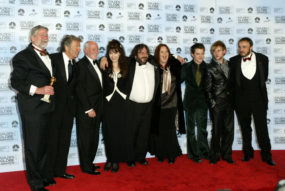 The cast and crew of "The Lord of The Rings: The Return of The King," winner for Best Motion Picture, Drama with Peter Jackson in the centre (Photo by J. Vespa/WireImage)