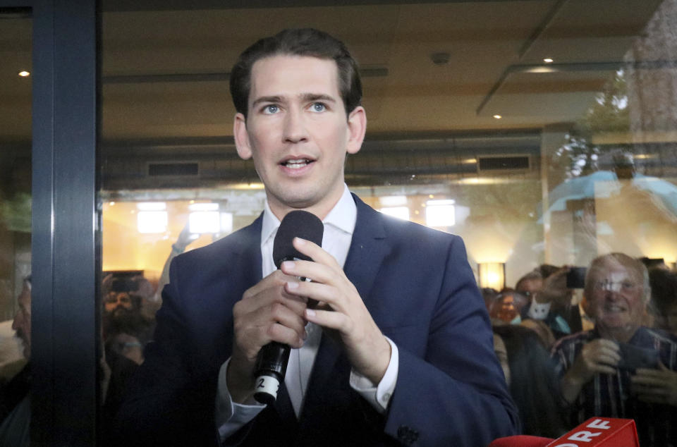 Austrian Chancellor Sebastian Kurz waves to his supporters at the political headquarters of Austrian People's Party, OEVP, in Vienna, Austria, Monday, May 27, 2019. Chancellor Sebastian Kurz's center-right party recorded a big win in European elections, but he was ousted Monday following the collapse of his scandal-tainted coalition. (AP Photo/Ronald Zak)