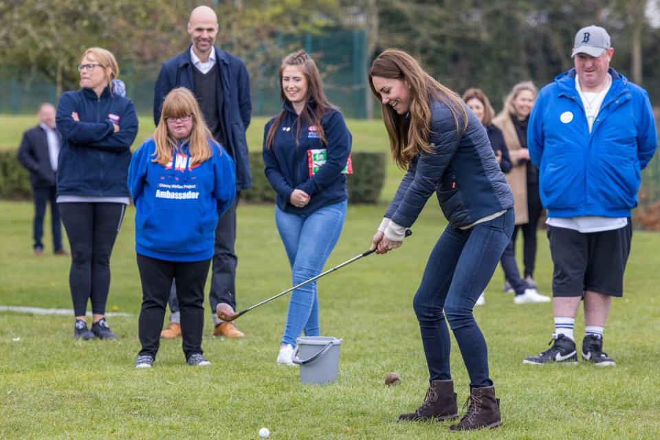 <p>The Duchess of Cambridge tried her hand at golf while visiting young people supported by the Cheesy Waffles Project, a charity for children and adults with special needs. The group played sports at the Belmont Community Center in Durham, UK. <br></p>