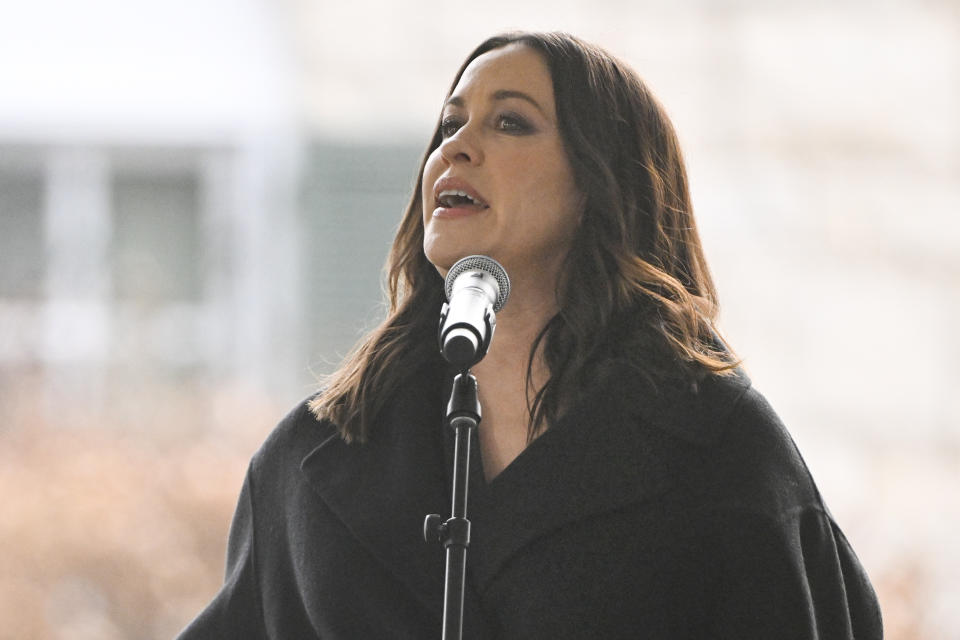 Alanis Morissette sings during a memorial service for Lisa Marie Presley Sunday, Jan. 22, 2023, in Memphis, Tenn. She died Jan. 12 after being hospitalized for a medical emergency and was buried on the property next to her son Benjamin Keough, and near her father Elvis Presley and his two parents. (AP Photo/John Amis)