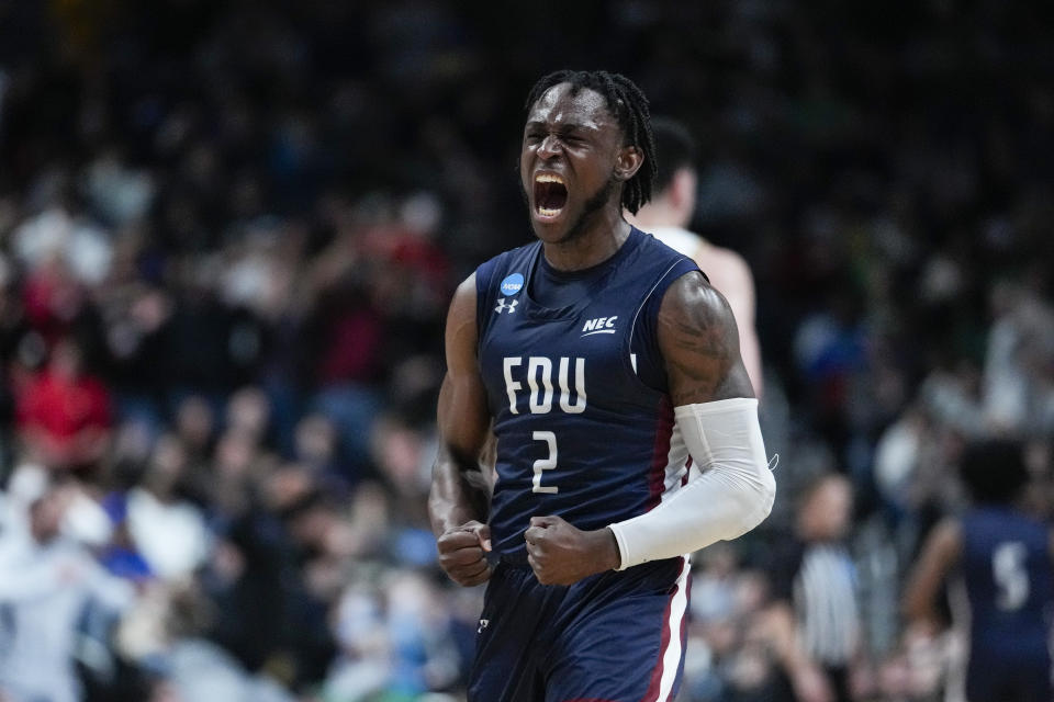 Fairleigh Dickinson guard Demetre Roberts (2) celebrates in the second half of a first-round college basketball game against Purdue in the men's NCAA Tournament in Columbus, Ohio, Friday, March 17, 2023. (AP Photo/Michael Conroy)