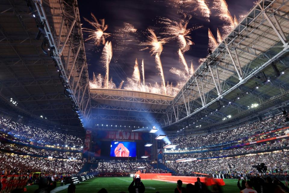 Rihanna’s show was lit up by a cacophony of fireworks  shooting out the roof of the stadium (Getty Images)